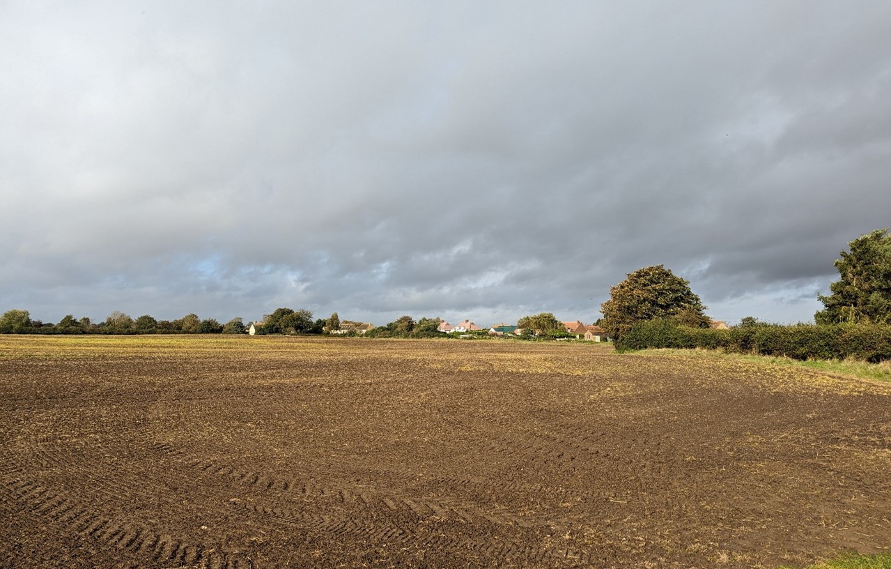 Garford seen across open arable fields