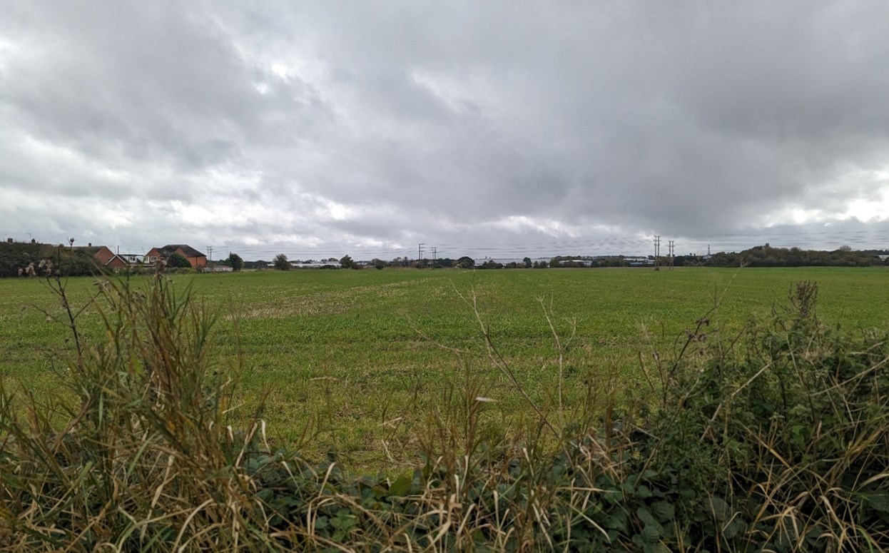 Open arable fields with electricity infrastructure (near Sutton Courtenay)