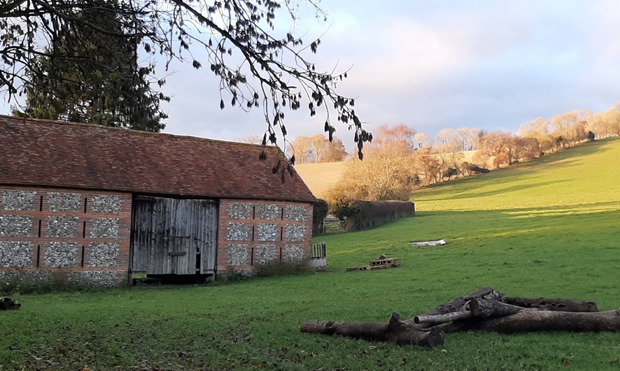 Historic agricultural buildings in the sloping landscape